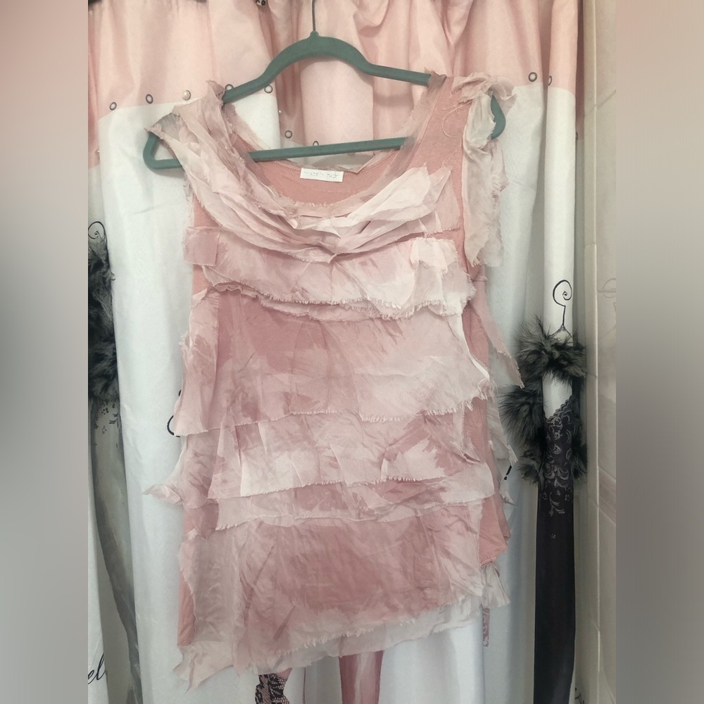 Women’s light pink asymmetrical top. Layers of ribboned pieces. Size small.